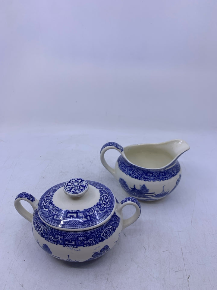 WHITE W/ BLUE ASIAN STYLE SCENE.