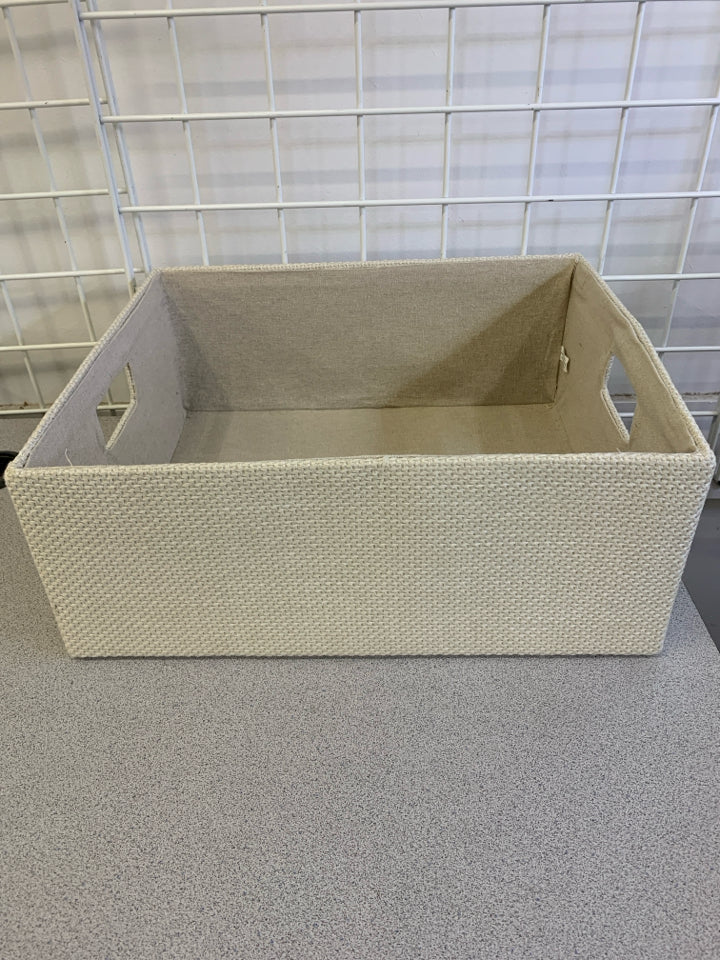 CREAM FABRIC STORAGE BIN.