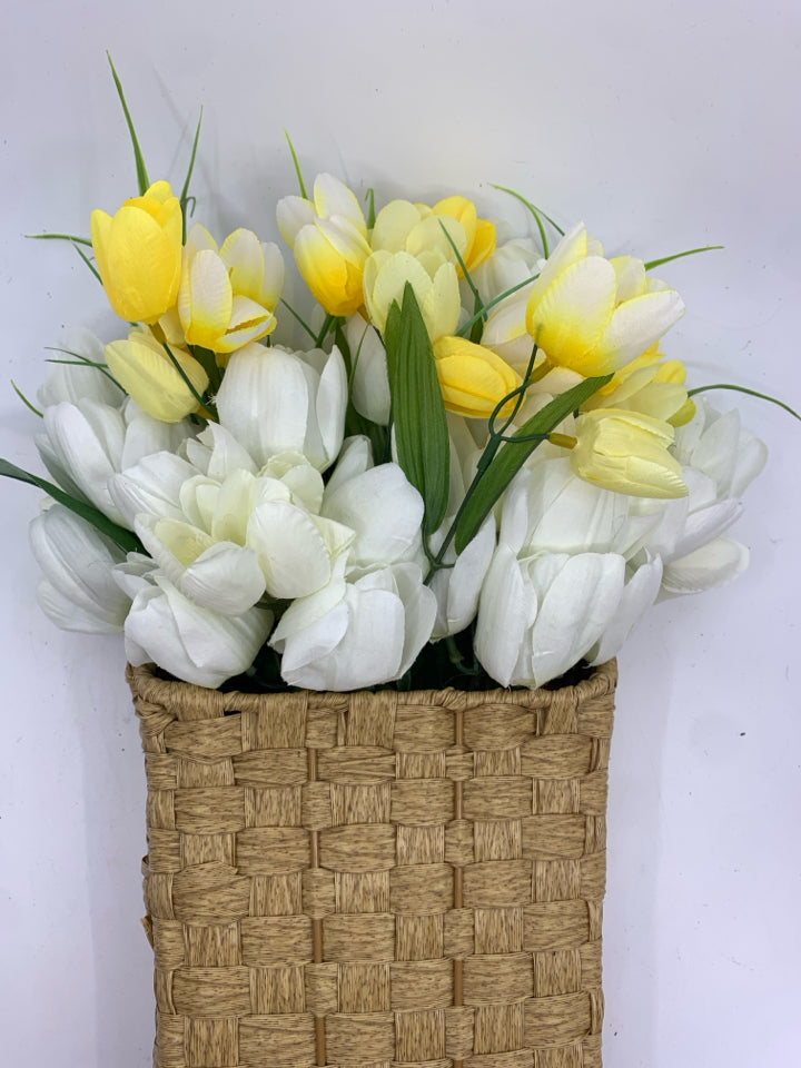 LIGHT WOVEN WALL BASKET W/ WHITE/YELLOW TULIPS.