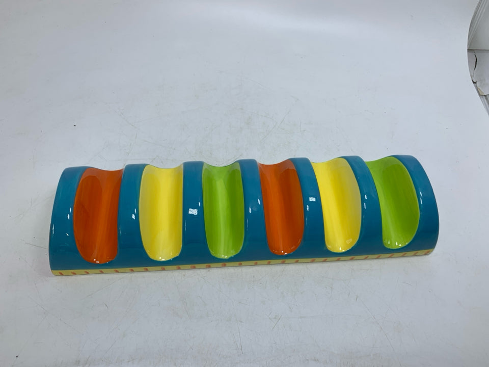 CERAMIC COLORFUL TACO SHELL HOLDER.