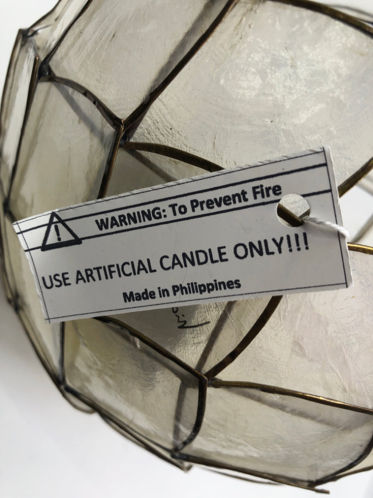 DELICATE FLORAL EGG SHAPED CANDLE HOLDER.