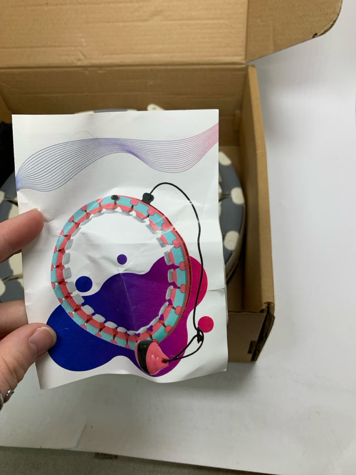IN BOX WEIGHTED HOOLA HOOP.