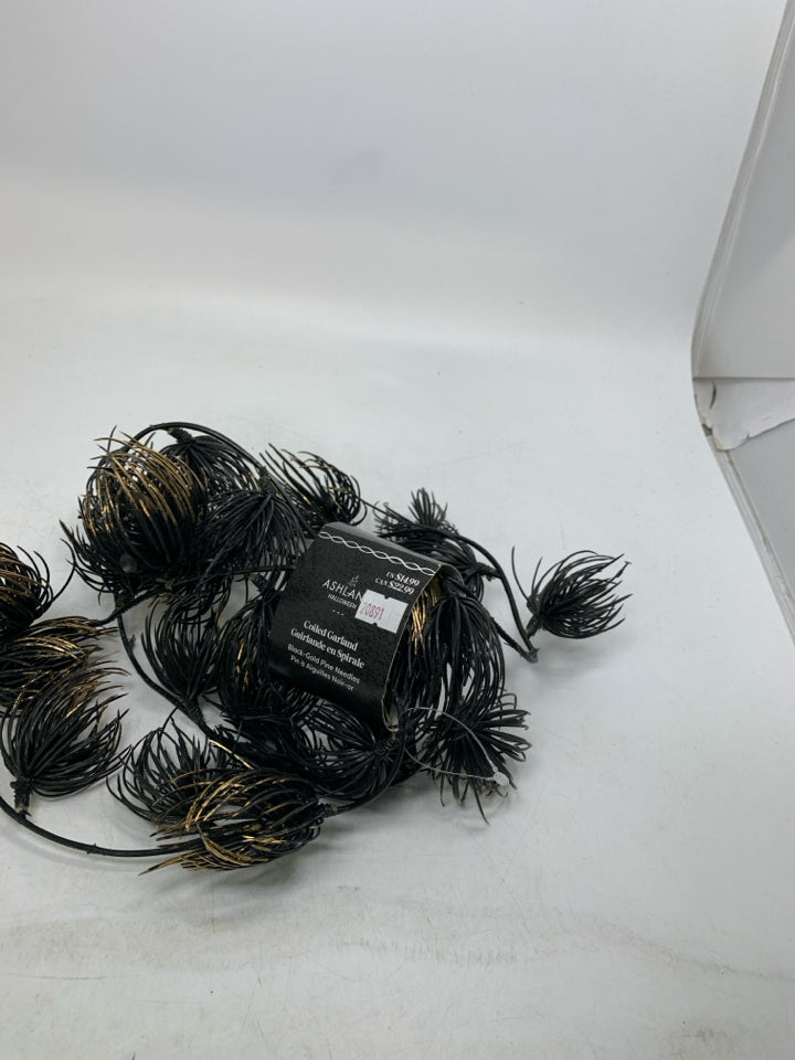 NEW BLACK COILED GARLAND.