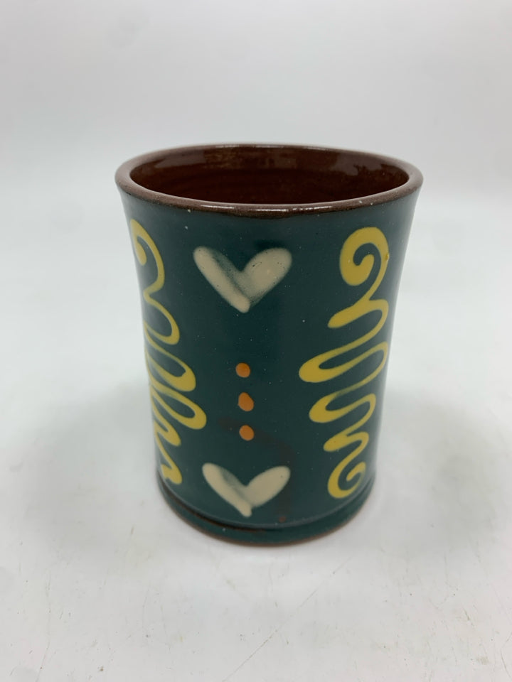 YELLOW HEART TERRA COTTA CUP.