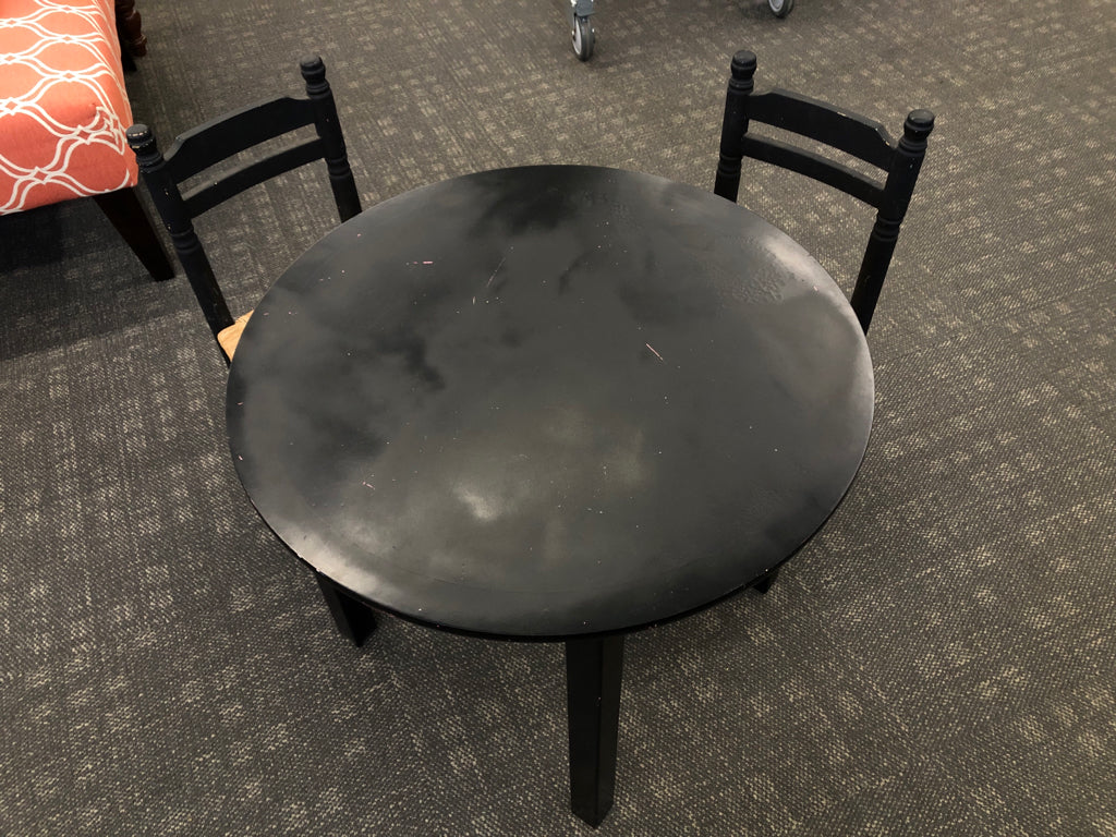 KIDS BLACK TABLE W/2 WICKER CHAIRS.