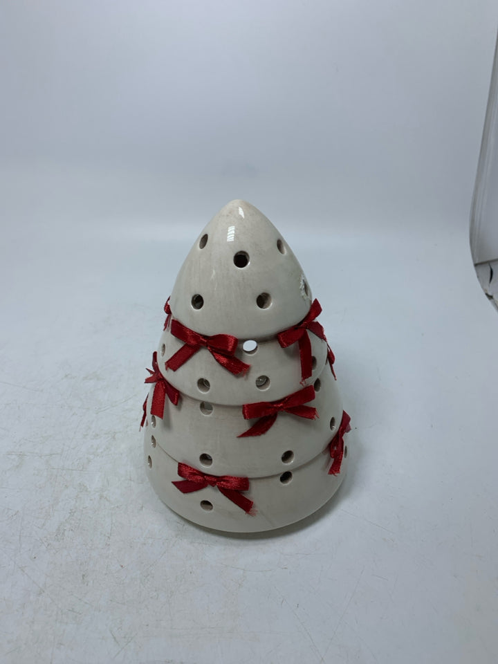 CREAM PIERCED CHRISTMAS TREE W/ RED BOWS TEALIGHT HOLDER.