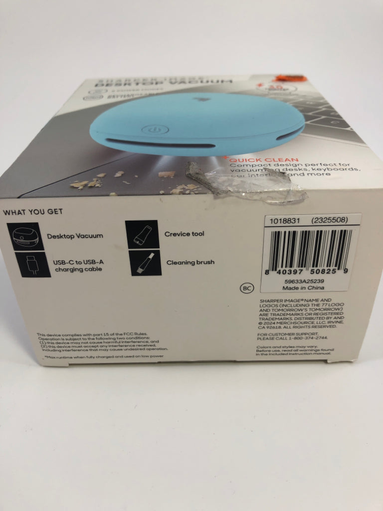 NIB SHARPER IMAGE DESKTOP VACUUM.