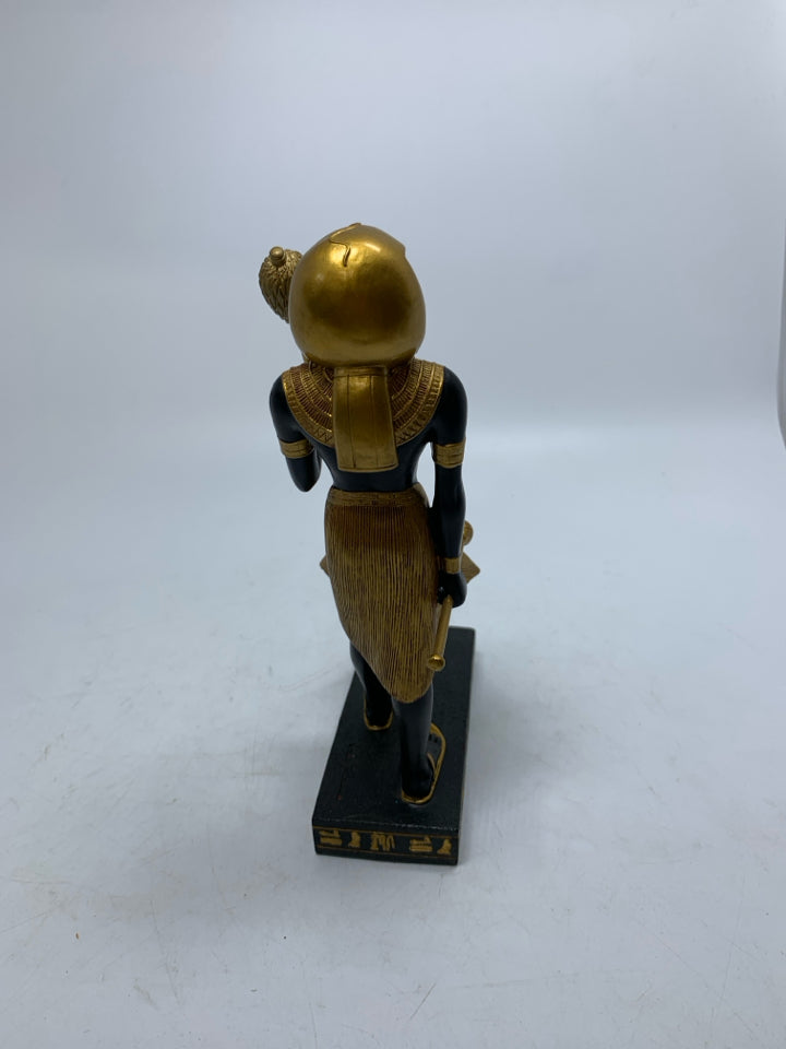 GOLD STANDING EGYPTIAN STYLE MAN W/ SANDALS HOLING STICK RESIN.