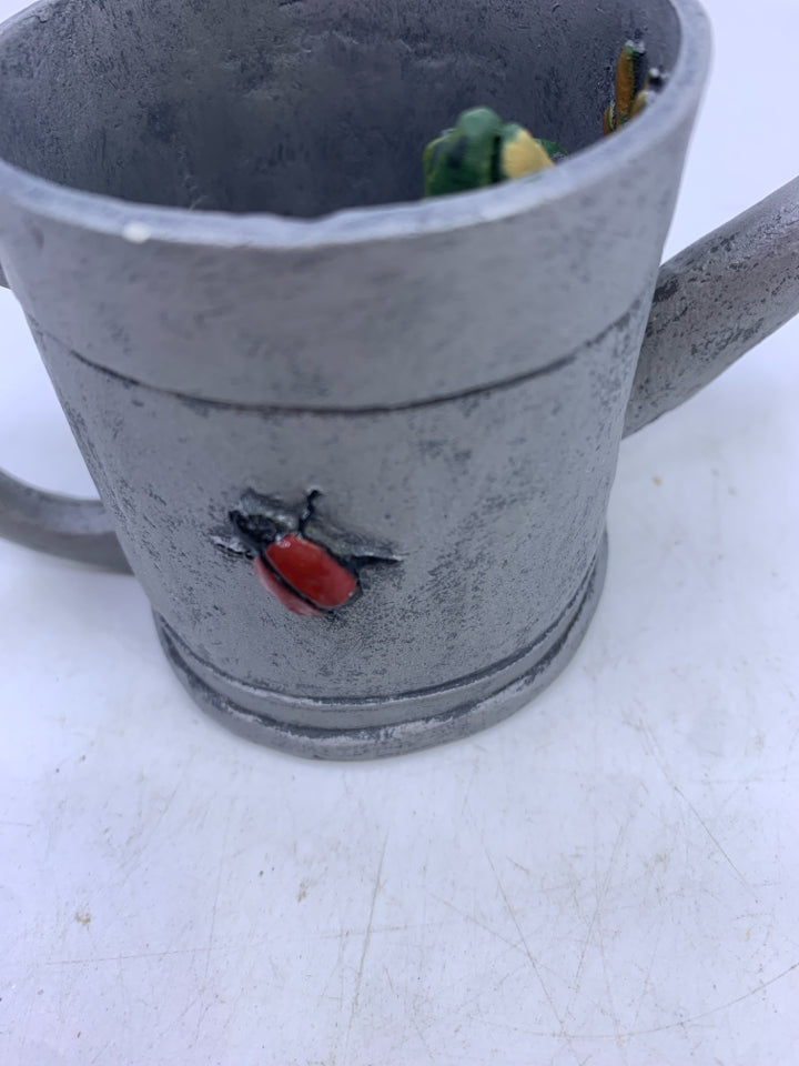 RESIN WATERING CAN W FROG AND LADYBUG.