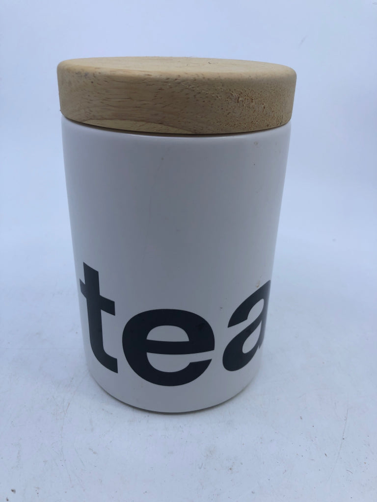 BLACK AND WHITE TEA CANISTER W WOOD TOP.