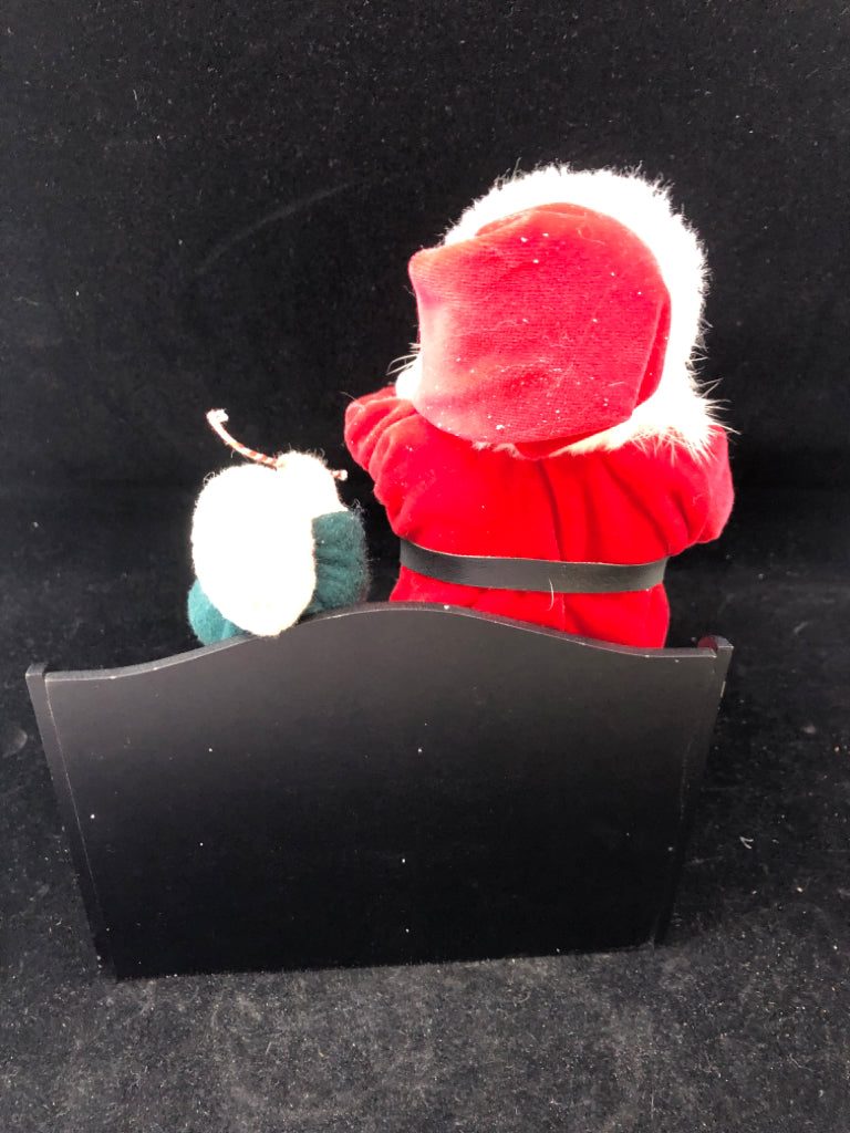 SANTA AND LITTLE BOY BYERS' CHOICE ON BENCH.