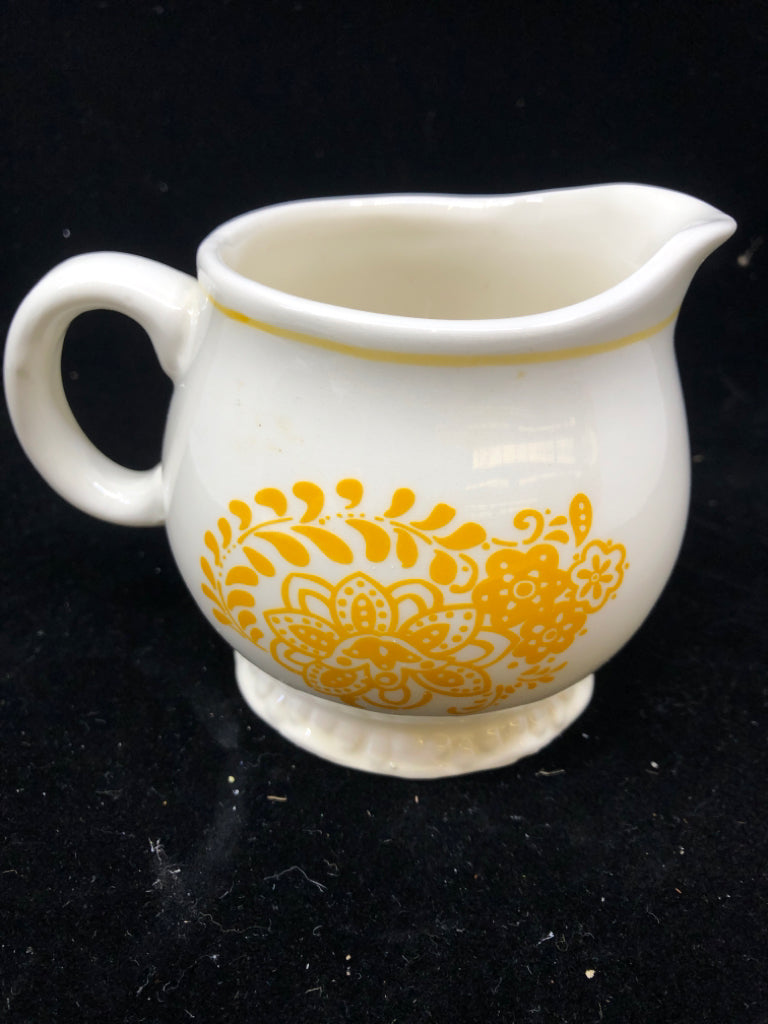 2 PC WHITE W/ RED/PURPLE FLOWERS SUG/CREAMER SET.