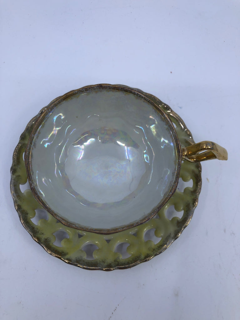 VTG PALE YELLOW W GOLD ACCENTS AND LACE PATTERN TEACUP AND SAUCER.