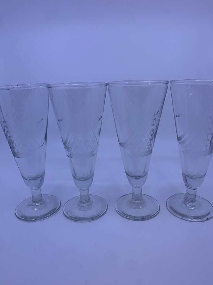 4 TALL FOOTED GLASSES W/ SAIL BOATS.