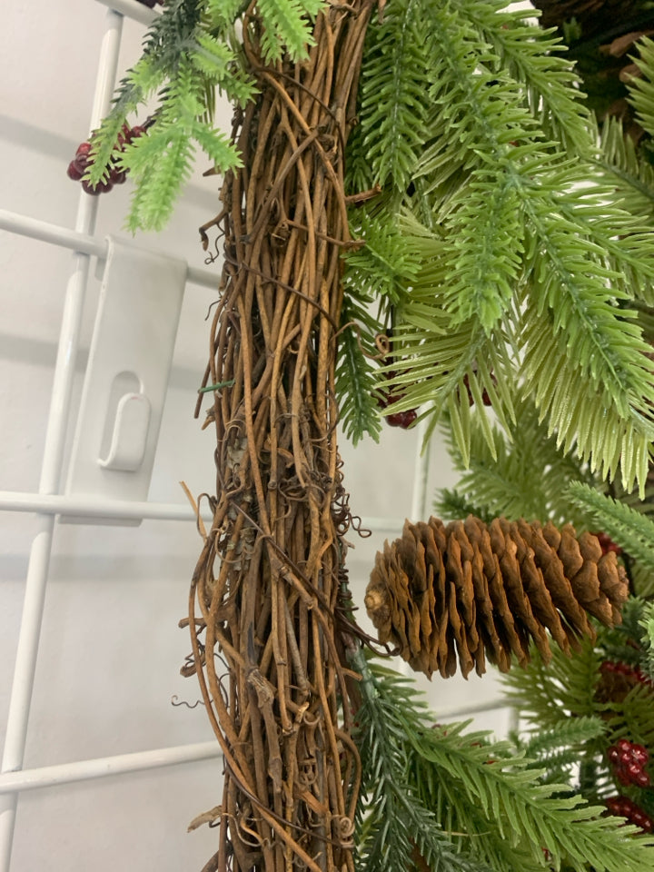 PINECONES AND RED PIP BERRY GARLAND.