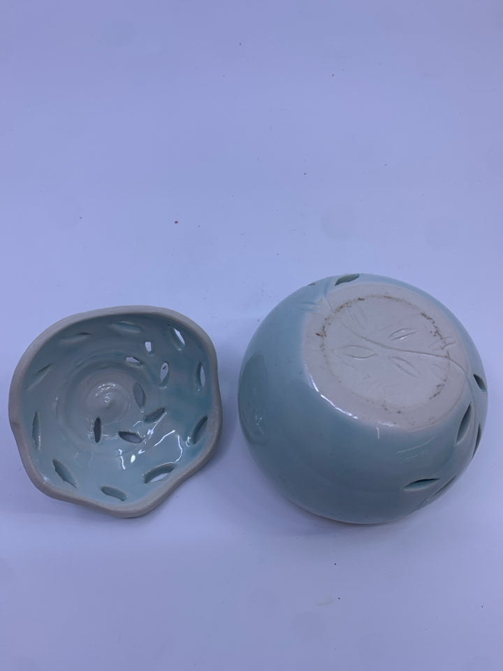 LIGHT BLUE PIERCED CANISTER W/ DOVES IN TOP.