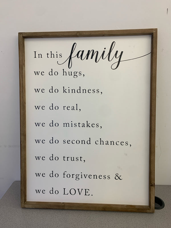 IN THIS FAMILY WHITE WALL HANGING IN WOOD FRAME.