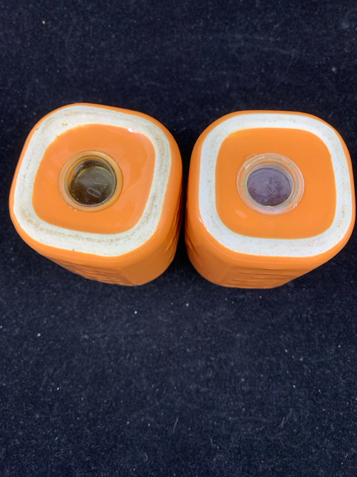 ORANGE SALT AND PEPPER MASON JAR STYLE SHAKERS.