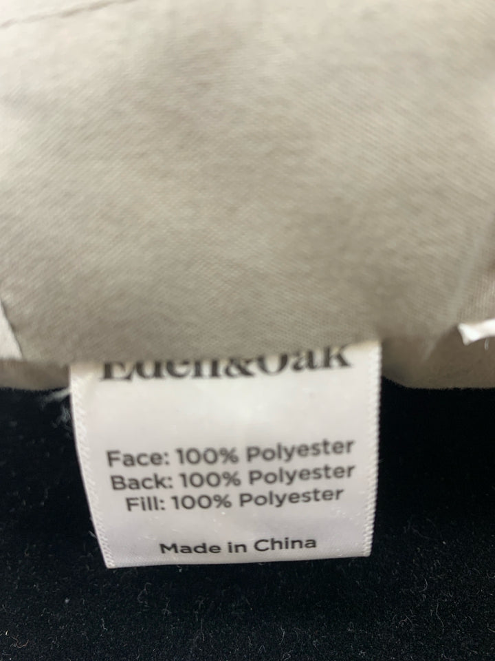 SKINNY GREY PILLOW W/ WHITE STRIPES.