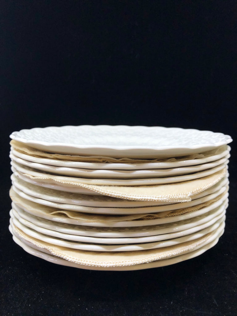 VTG 13 WHITE EMBOSSED FLORAL PLATES.