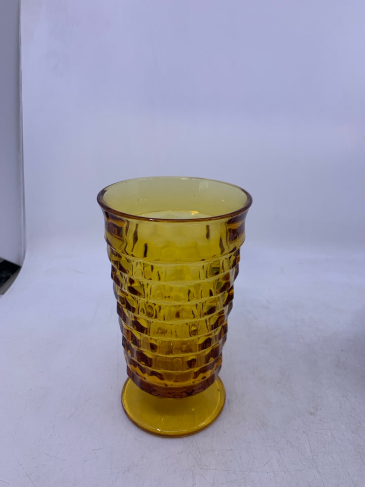 TEXTURED AMBER GLASS FOOTED VASE.