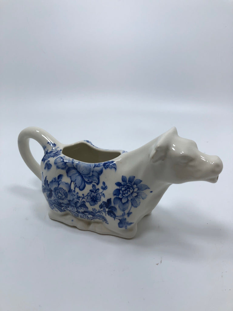 VTG CROWN DEVON WHITE CREAM COW W/BLUE FLORAL DESIGN.