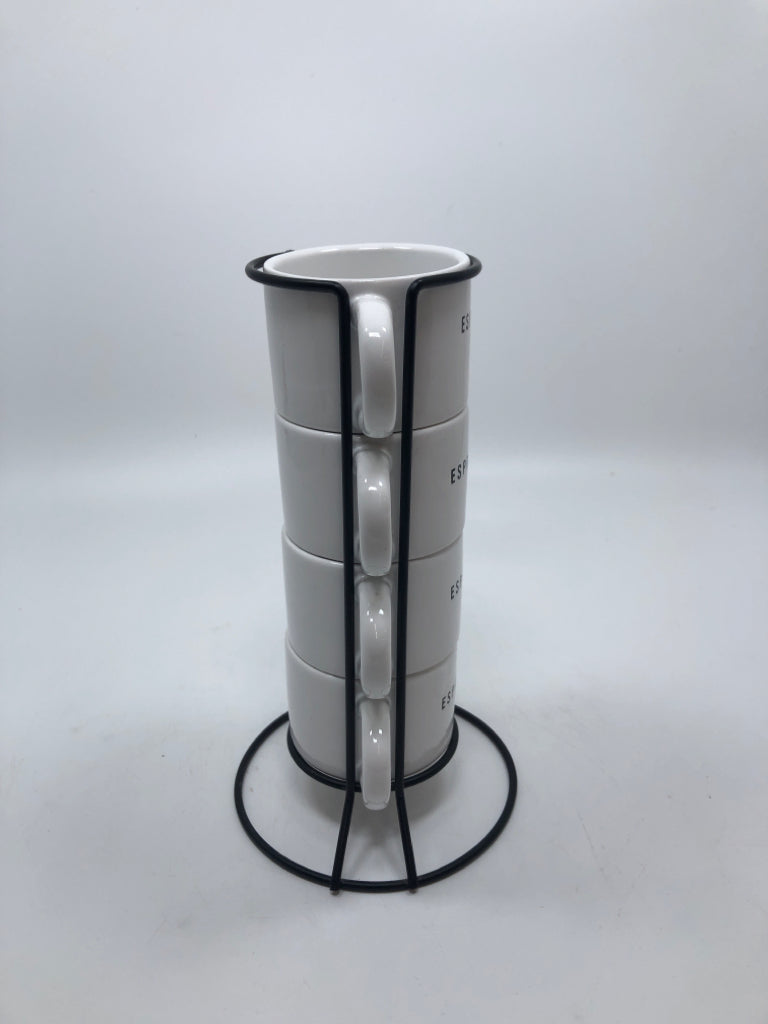4 STACKED ESPRESSO CUPS IN BLACK HOLDER.