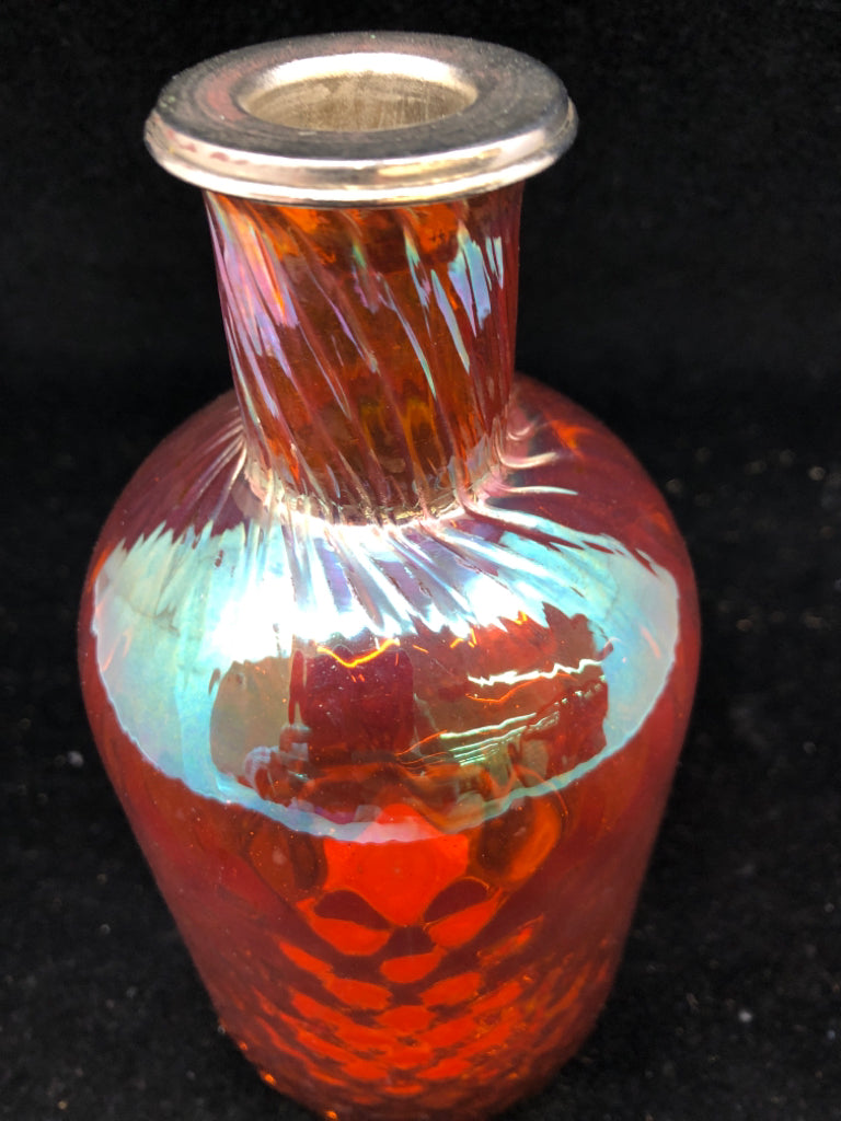 ORANGE GLASS TAPER CANDLE HOLDER.