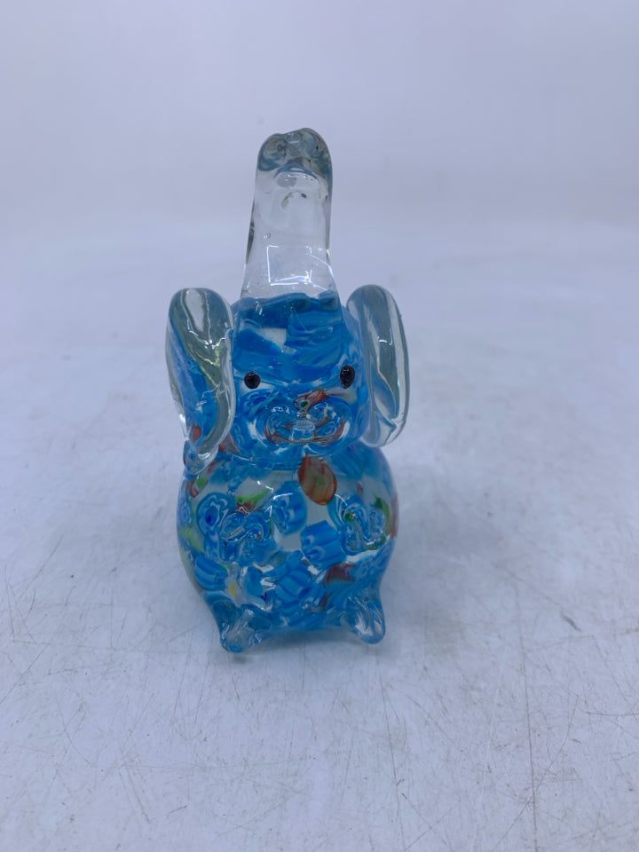 BLUE SITTING ELEPHANT W/ TRUNK UP.