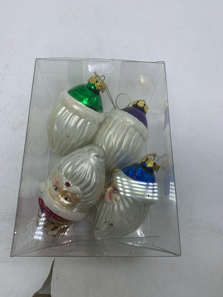 IN BOX 4 GLASS SANTA HEADS ORNAMENTS.