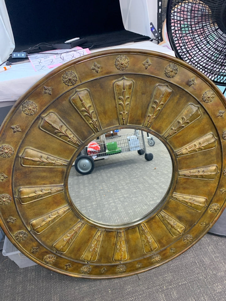 LARGE ROUND BRONZE METAL WALL MIRROR.