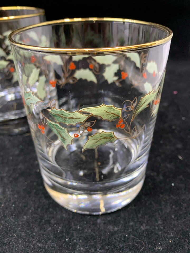4 CLEAR GLASS WATER GLASSES HOLLY DESIGN GOLD RIM.