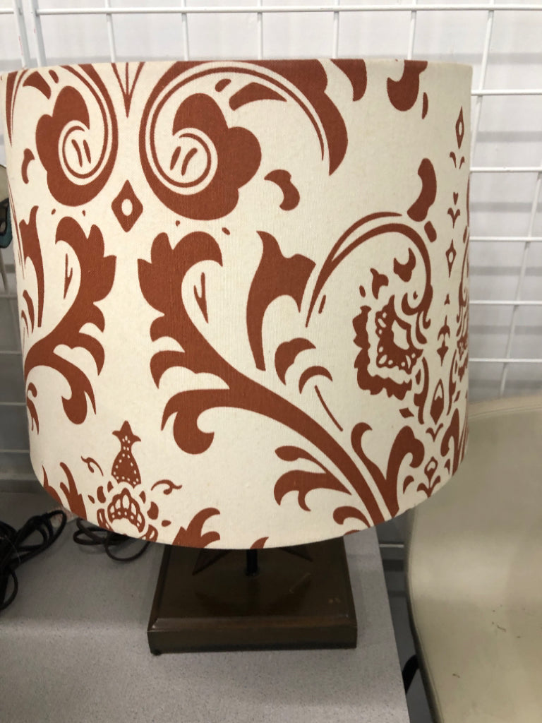 RUSTIC STAR LAMP W/ ORANGE+CREAM SHADE.