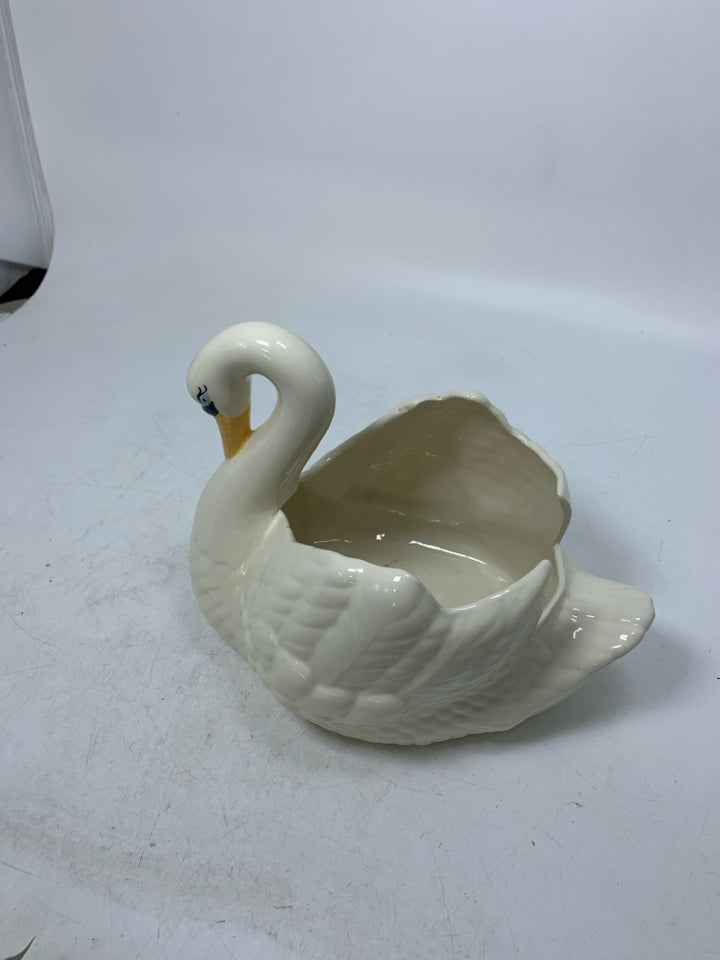 SWAN SHAPED PLANTER.