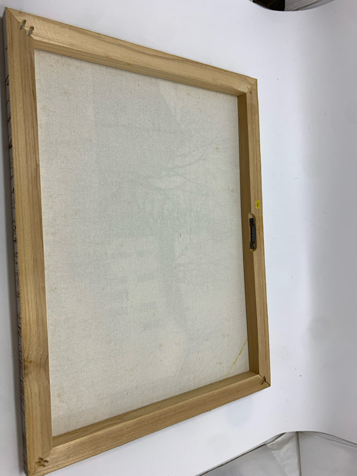 PRIMITIVE STYLE CANVAS W/ HOUSES BEAR TREES AND SNOW ON THE GROUND.