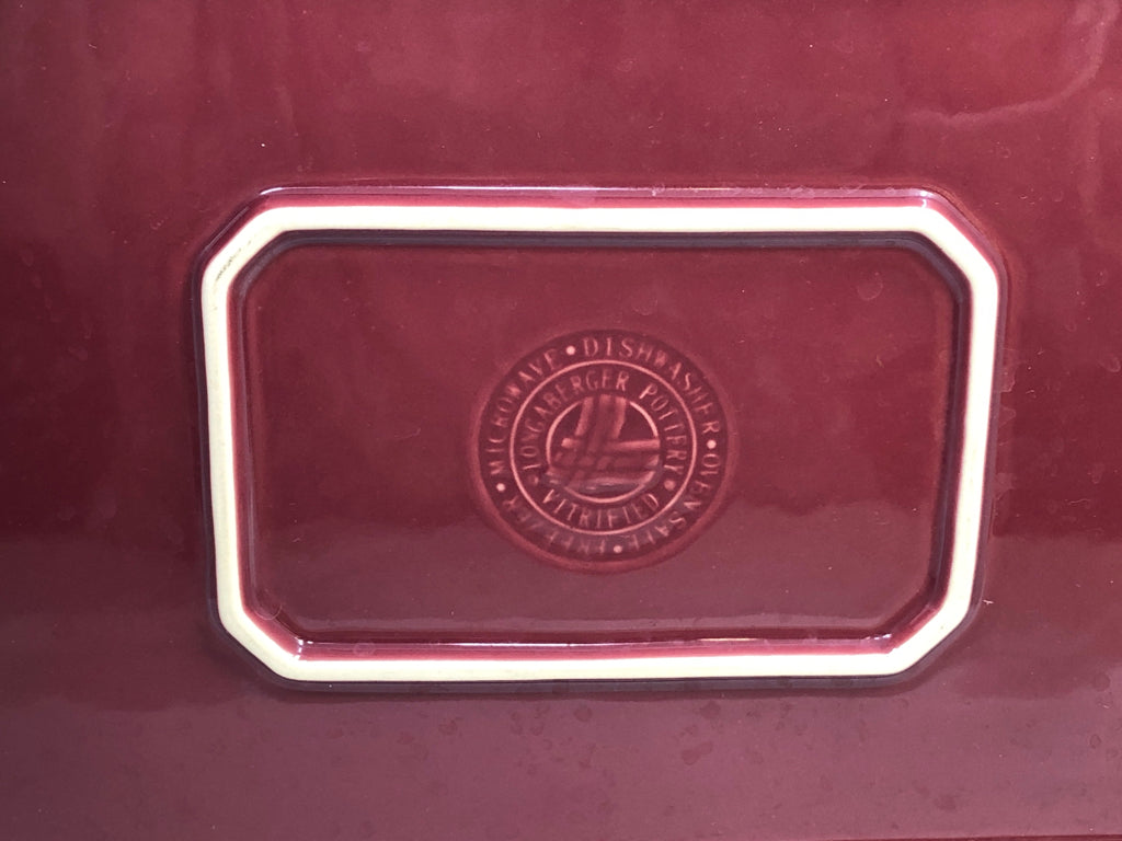 MAROON LONGABERGER POTTERY TRAY.