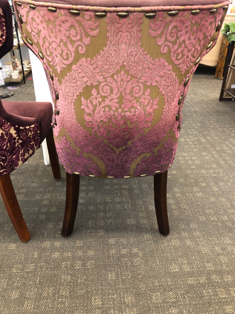 2 MAROON SUEDED CHAIRS W/PAISLEY DESIGN ON BACK & WOOD LEGS.
