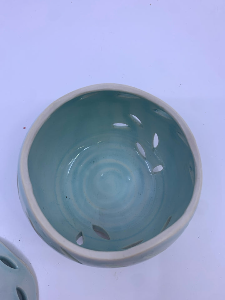 LIGHT BLUE PIERCED CANISTER W/ DOVES IN TOP.