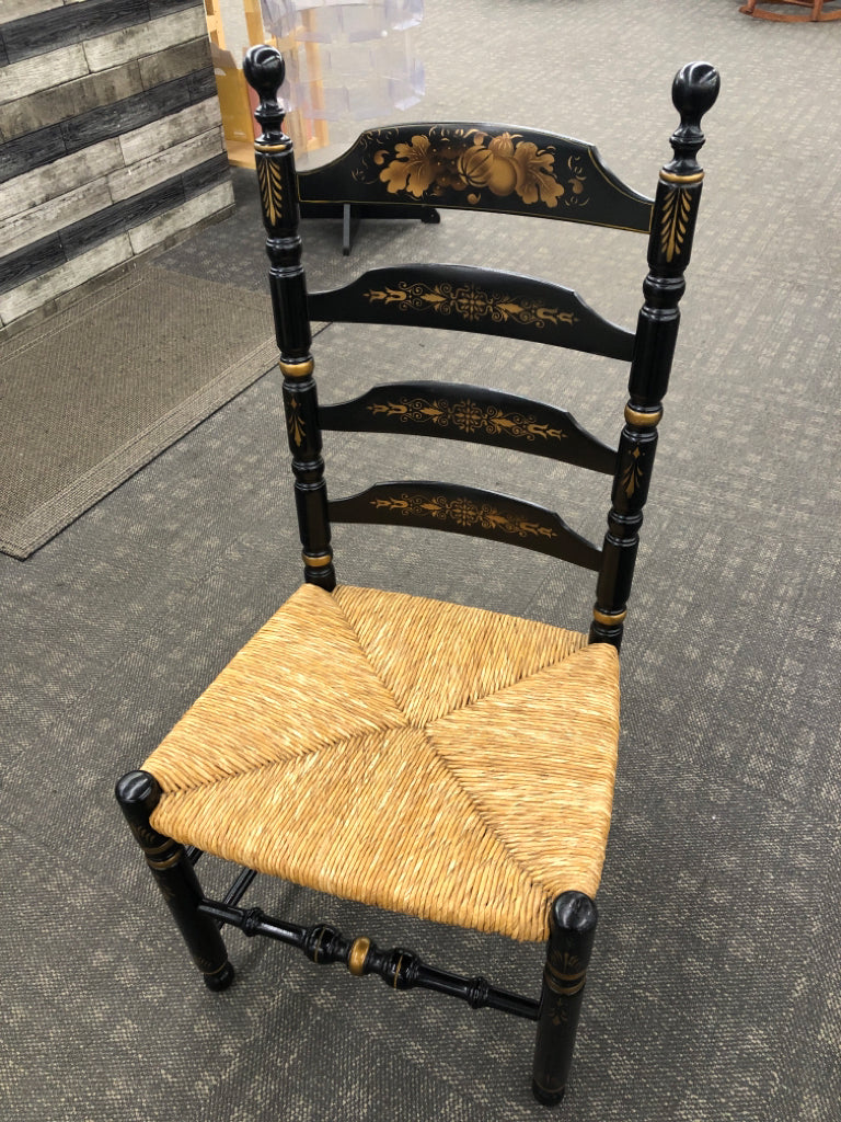LADDER BACK CHAIR W/HARVEST PATTERN AND WOVEN SEAT.