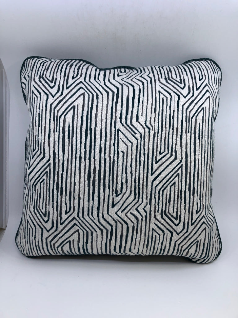 BLUE & WHITE PILLOW W/ABSTRACT LINE DESIGN.