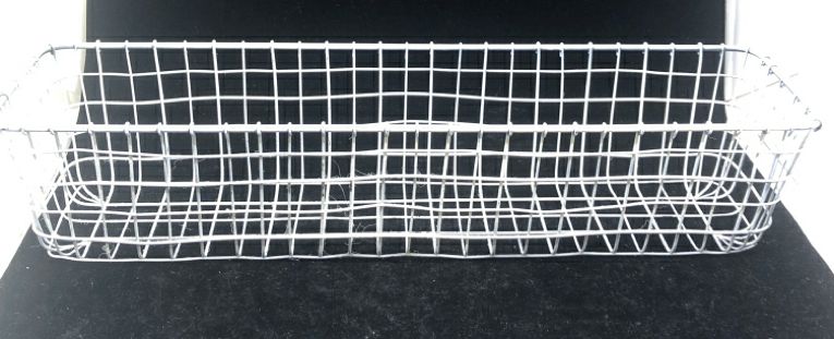 LONG WHITE METAL BASKET.