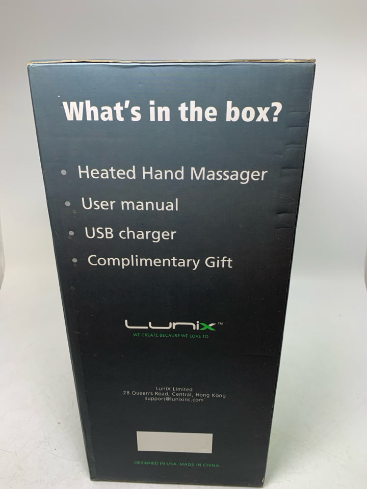 NIB LUNIX CORDLESS HAND MASSAGER.