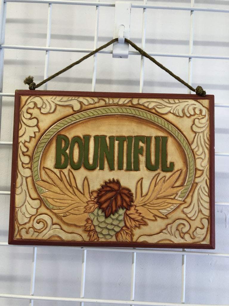 WOOD HANGING PICTURE WITH THE WORD BOUNTIFUL.