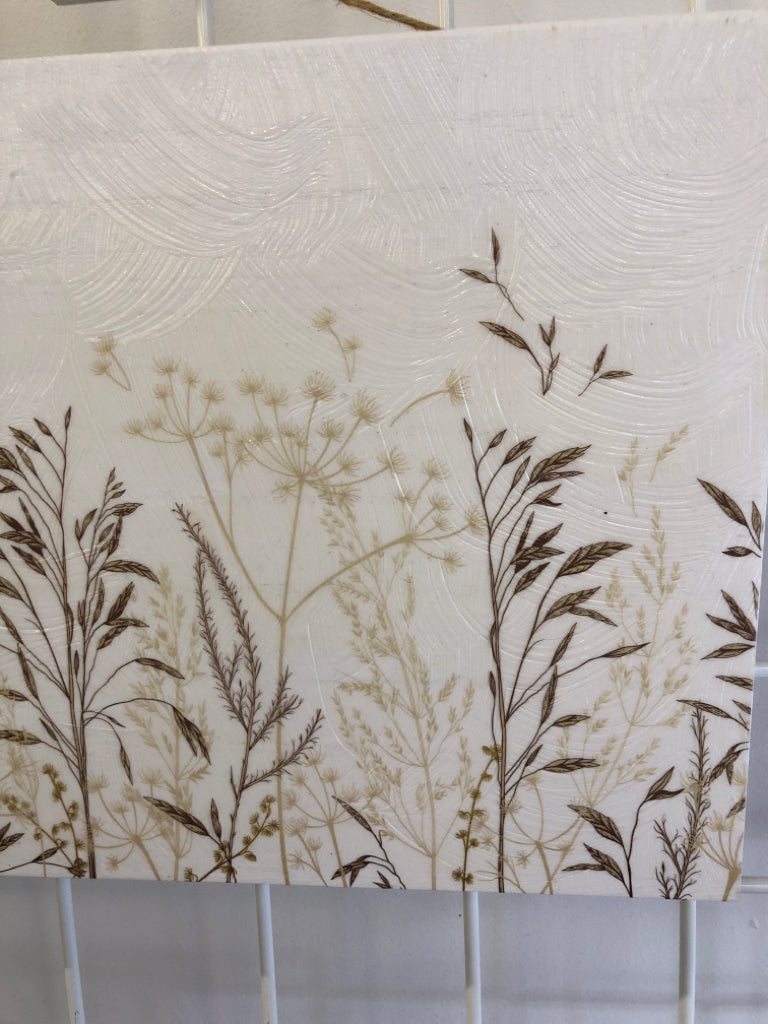 WHITE WOOD W/PAINTED LEAVES ON STEMS WALL HANGING.