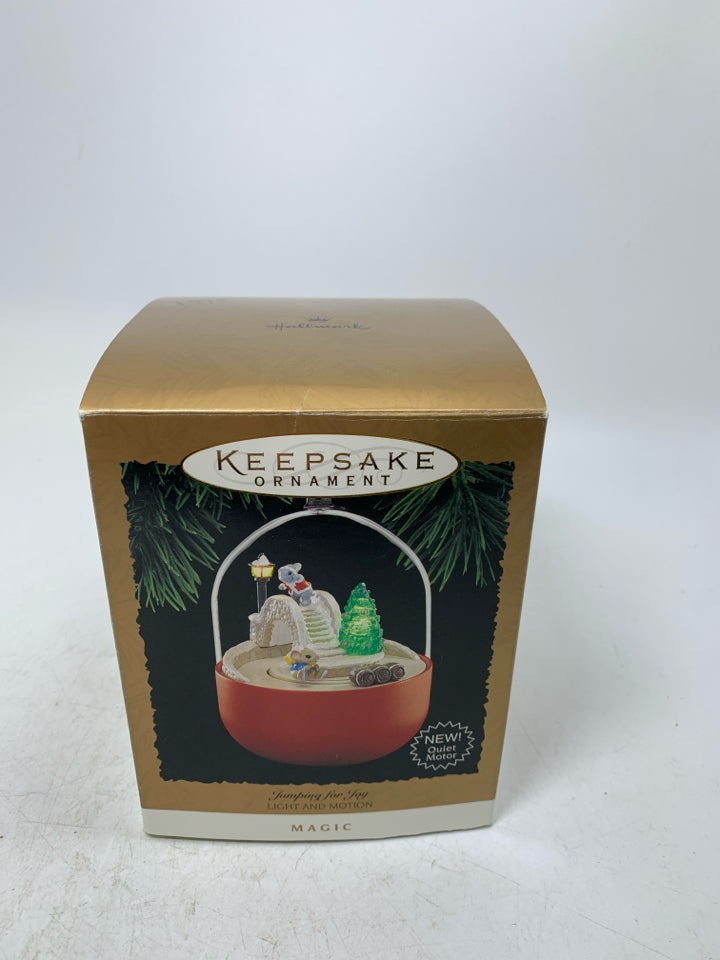 IN BOX HALLMARK JUMPING FOR JOY LIGHT & MOTION ORNAMENT.