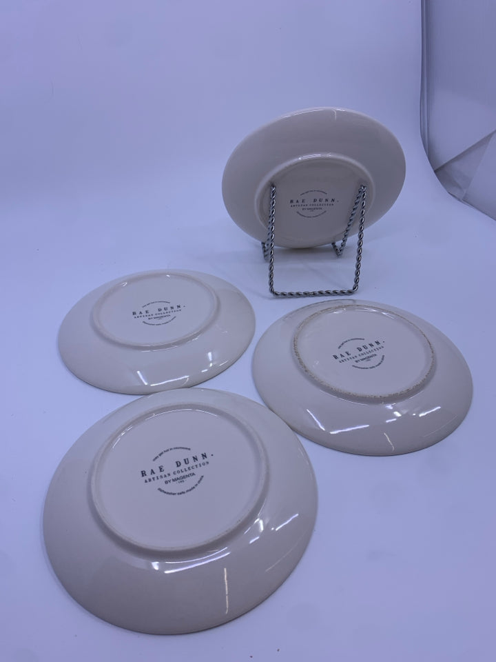 4 RAE DUNN STAGES OF A JACK O LANTERN PLATES.