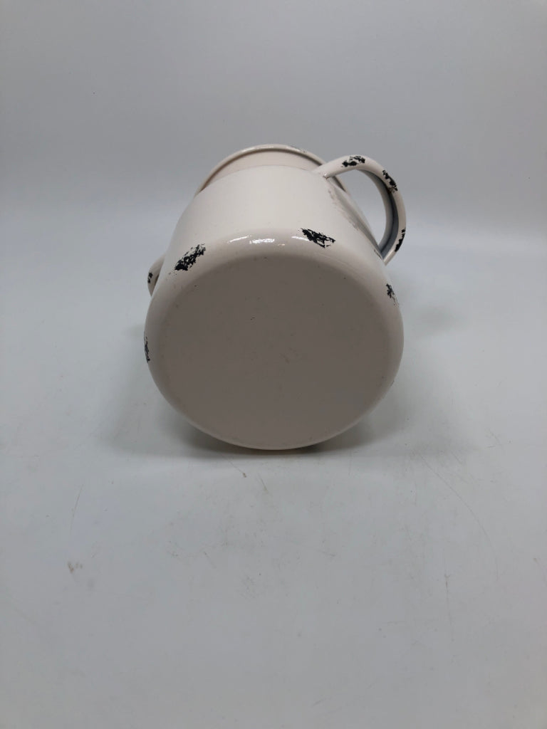 WHITE METAL MILK JUG.