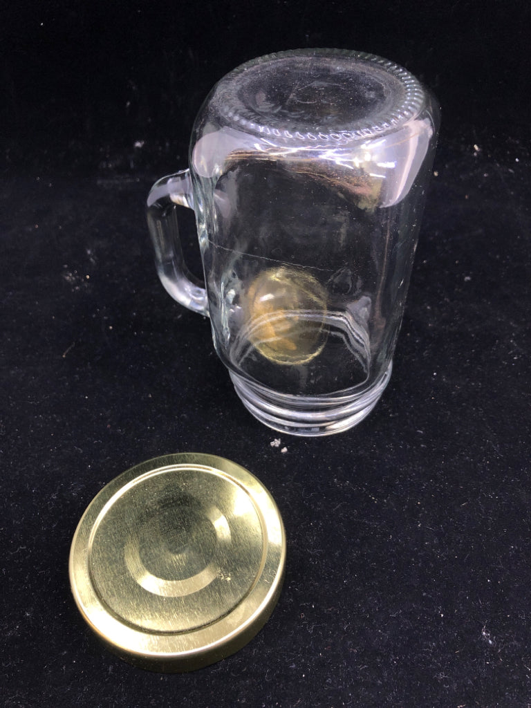 JAR STYLE MUG W HANDLE AND GOLD LID.