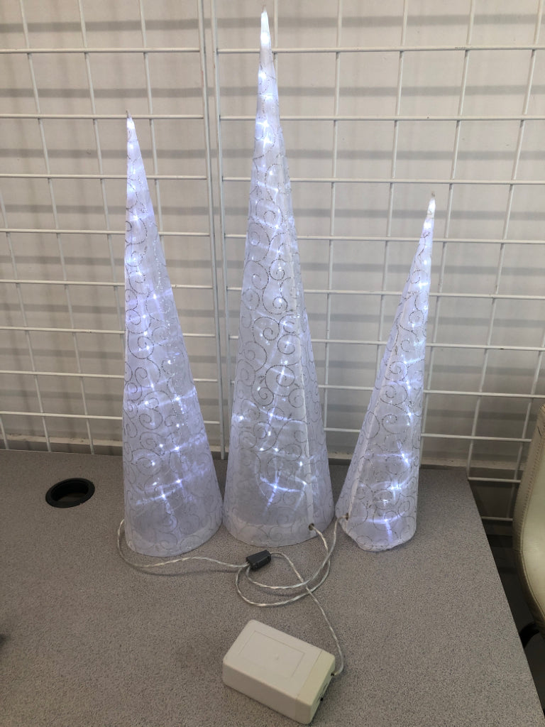 3 CONNECTED LIGHT-UP TREES.