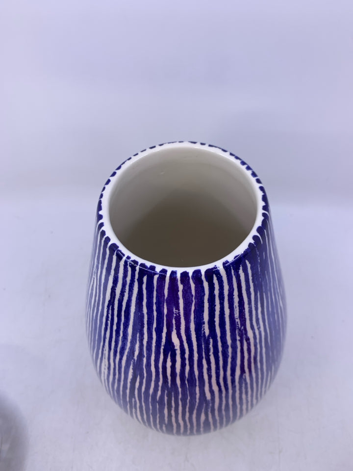 WHITE CERAMIC VASE W/ BLUE STRIPES.